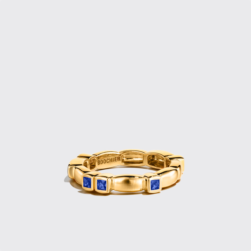 YELLOW GOLD BLUE SAPPHIRE ARCADE ETERNITY RING