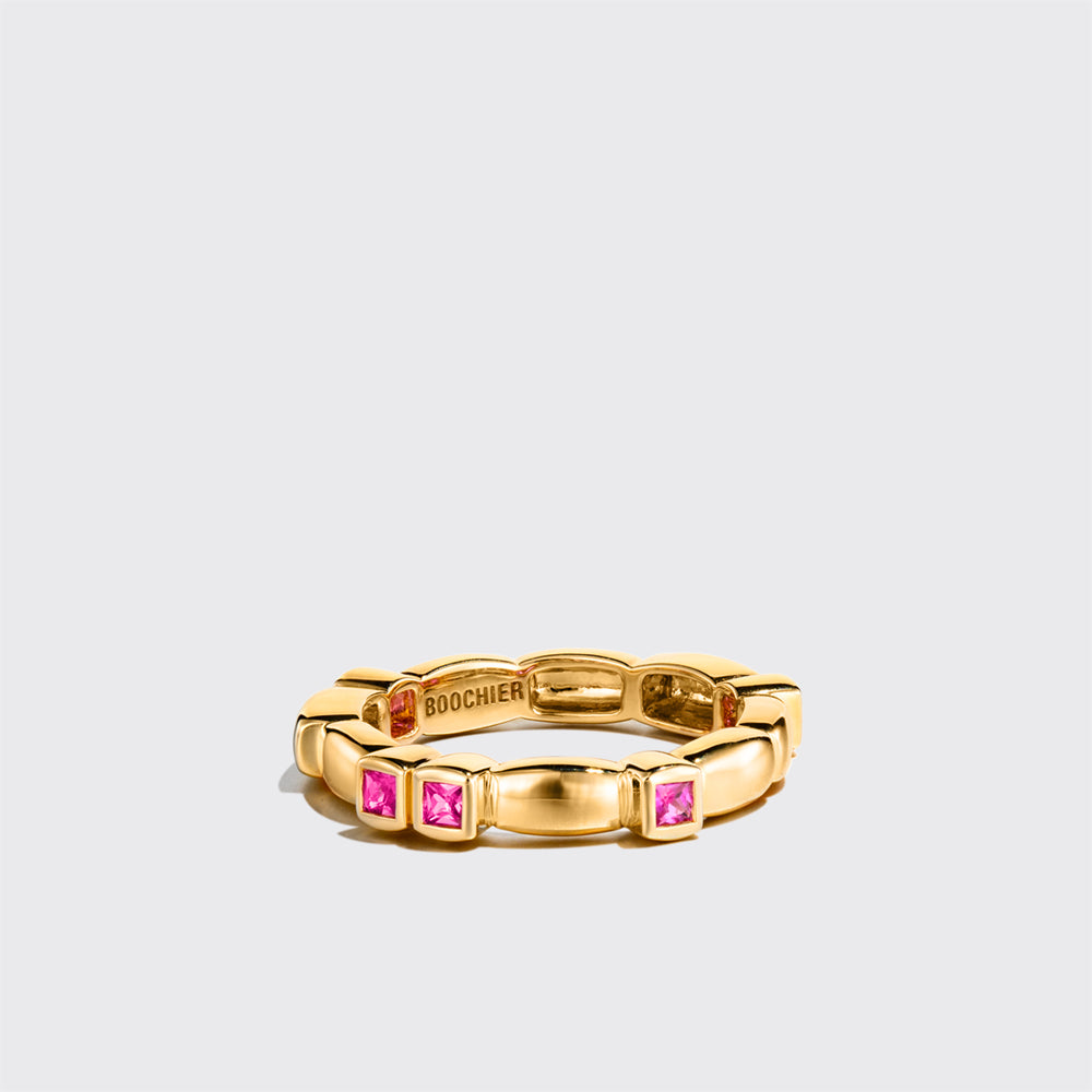 YELLOW GOLD PINK SAPPHIRE ARCADE ETERNITY RING